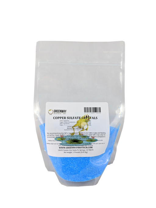 Close-up of vibrant blue copper sulfate crystals in a container for agricultural and pond management use